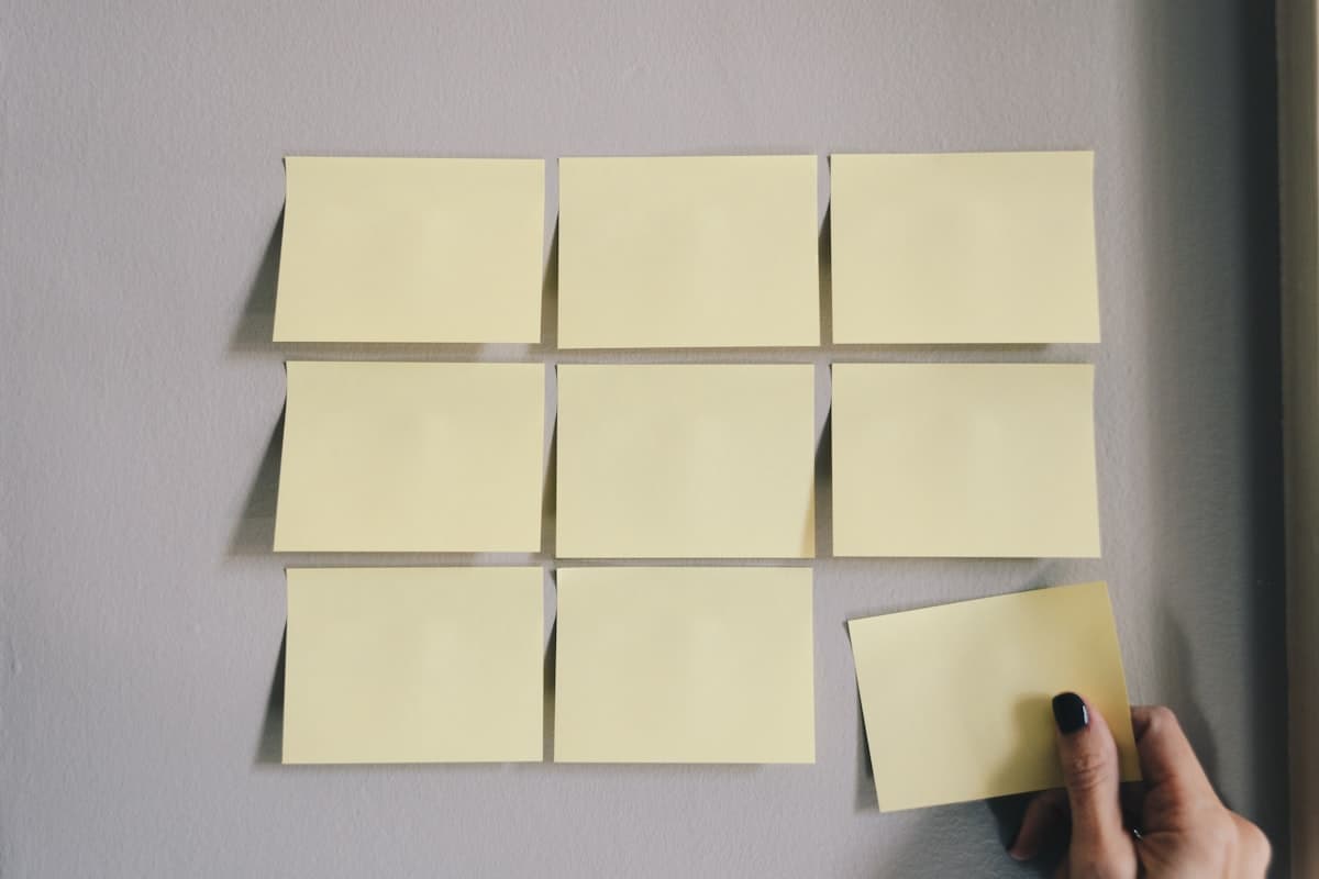Team mapping out a business plan on a whiteboard